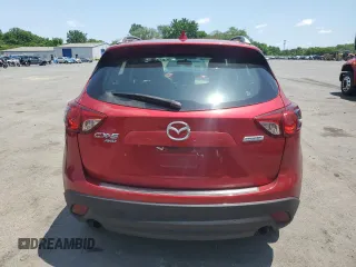 2016 Mazda CX-5 Sport with VIN JM3KE4BY3G0765905, listed as a Copart auction lot 61874165 with 134,546 mi miles and Salvage title. Bid and sale history available at DreamBid. Image 6.