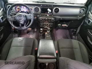2021 Jeep Wrangler Unlimited Willys with VIN 1C4HJXDNXMW648849, listed as a Copart auction lot 55942895 with 28,240 mi miles and Salvage Title. Bid and sale history available at DreamBid. Image 8.