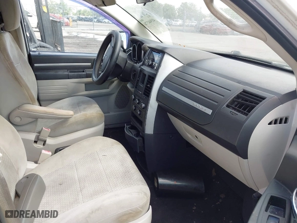 2010 Dodge Grand Caravan SE with VIN 2D4RN4DE5AR490306, listed as a IAAI auction lot 41944376 with 127,107 mi miles. Bid and sale history available at carsss.com. Image 5.