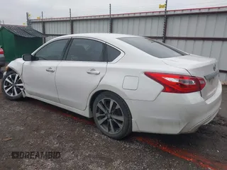 2016 Nissan Altima SR with VIN 1N4AL3AP7GC277879, listed as a IAAI auction lot 41523475 with 128,821 mi miles and . Bid and sale history available at carsss.com. Image 3.