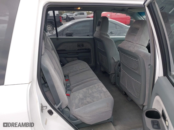 2004 Honda Pilot EX with VIN 2HKYF18464H503605, listed as a IAAI auction lot 41373673 with 112,919 mi miles. Bid and sale history available at carsss.com. Image 8.