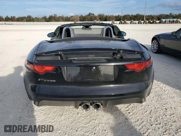 2014 Jaguar F-Type V6 with VIN SAJWA6E74E8K06478, listed as a Copart auction lot 76975894 with Not Provided miles and Salvage Title. Bid and sale history available at DreamBid. Image 6.