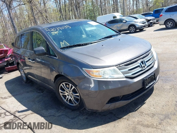 2012 Honda Odyssey EX-L with VIN 5FNRL5H68CB006686, listed as a IAAI auction lot 42039035 with 338,331 mi miles and . Bid and sale history available at carsss.com. Image 1.