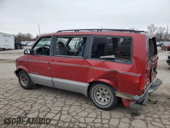 1997 GMC Safari z VIN 1GKEL19WXVB530471, wystawiony jako Copart lot #86403504 z przebiegiem Nie podano mil oraz Szkoda całkowita • Salvage title. Historia ofert i sprzedaży dostępna na DreamBid. Obrazek 2.