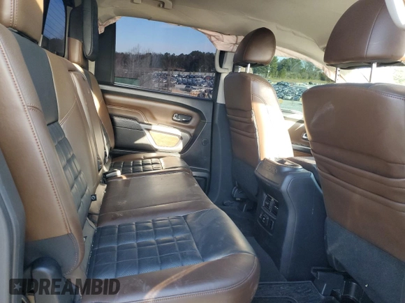 2016 Nissan Titan Platinum Reserve z VIN 1N6BA1F28GN508716, wystawiony jako Copart lot #46797225 z przebiegiem 168 572 mil mil oraz Szkoda całkowita • Salvage title. Historia ofert i sprzedaży dostępna na DreamBid. Obrazek 11.