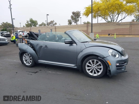 2018 Volkswagen Beetle S z VIN 3VW5DAAT3JM506023, wystawiony jako IAAI lot #42414886 z przebiegiem 33 424 mil mil oraz . Historia ofert i sprzedaży dostępna na DreamBid. Obrazek 14.