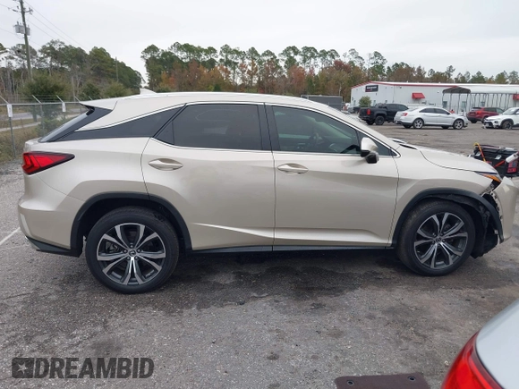 2018 Lexus RX with VIN 2T2ZZMCA9JC099803, listed as a IAAI auction lot 41052078 with 32,423 mi miles. Bid and sale history available at carsss.com. Image 13.