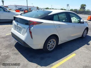 2018 Toyota Prius Two with VIN JTDKBRFU7J3075635, listed as a IAAI auction lot 42003329 with 77,909 mi miles. Bid and sale history available at carsss.com. Image 4.