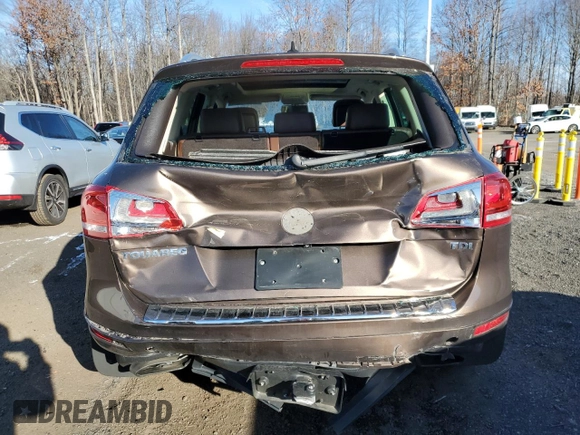 2013 Volkswagen Touareg Sport с VIN WVGEP9BP5DD003924, выставлен на аукционе Copart как лот 83310484 с пробегом Не указан миль и Списание • Salvage title. История ставок и продаж доступна на DreamBid. Изображение 6.