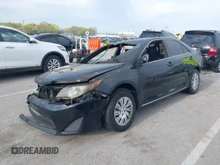 2012 Toyota Camry L z VIN 4T4BF1FK5CR206015, wystawiony jako IAAI lot #42057641 z przebiegiem Nie podano mil oraz . Historia ofert i sprzedaży dostępna na DreamBid. Obrazek 17.