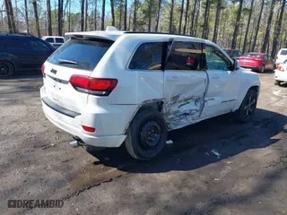 2015 Jeep Grand Cherokee Altitude with VIN 1C4RJFAG4FC924869, listed as a IAAI auction lot 41656444 with 112,786 mi miles. Bid and sale history available at carsss.com. Image 4.