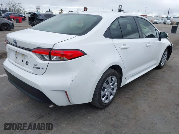 2023 Toyota Corolla Hybrid LE with VIN JTDBCMFE3PJ010097, listed as a IAAI auction lot 41786656 with 50,775 mi miles. Bid and sale history available at carsss.com. Image 4.