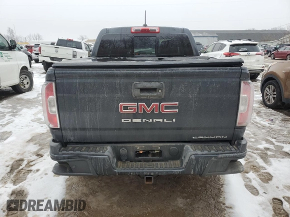 2021 GMC Canyon 4WD Denali with VIN 1GTG6EENXM1199427, listed as a Copart auction lot 86018624 with 98,520 mi miles and Salvage Title. Bid and sale history available at carsss.com. Image 6.