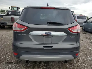 2015 Ford Escape Titanium with VIN 1FMCU9J96FUB32972, listed as a Copart auction lot 62886145 with 215,769 mi miles and Salvage title. Bid and sale history available at DreamBid. Image 6.