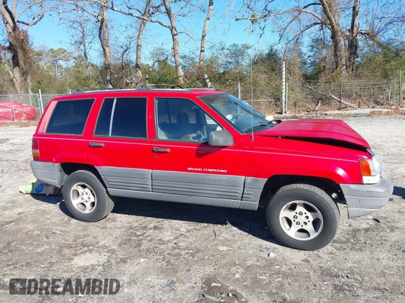 1996 Jeep Grand Cherokee Laredo with VIN 1J4EX58S8TC122302, listed as a IAAI auction lot 41218573 with 195,392 mi miles. Bid and sale history available at carsss.com. Image 13.
