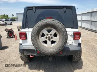 2018 Jeep Wrangler Unlimited Rubicon with VIN 1C4HJXFG9JW308991, listed as a Copart auction lot 53638955 with 95,508 mi miles and Salvage title. Bid and sale history available at DreamBid. Image 6.