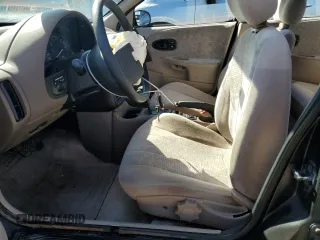 1998 Saturn SL with VIN 1G8ZK5272WZ253120, listed as a Copart auction lot 72911384 with 140,198 mi miles and Salvage title. Bid and sale history available at DreamBid. Image 7.