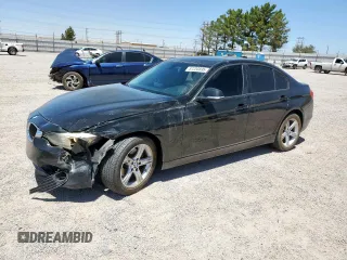 2014 BMW 3 Series 320i with VIN WBA3B1C57EK132668, listed as a Copart auction lot 57253895 with 123,549 mi miles and Salvage title. Bid and sale history available at DreamBid. Image 1.