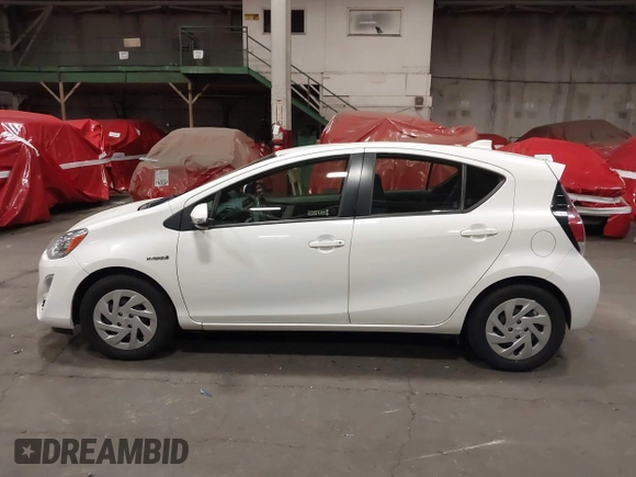 2016 Toyota Prius One z VIN JTDKDTB33G1121647, wystawiony jako IAAI lot #42020194 z przebiegiem 72 535 mil mil oraz . Historia ofert i sprzedaży dostępna na DreamBid. Obrazek 14.