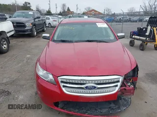 2011 Ford Taurus Limited with VIN 1FAHP2FW7BG124983, listed as a IAAI auction lot 41794287 with 125,969 mi miles and . Bid and sale history available at carsss.com. Image 12.
