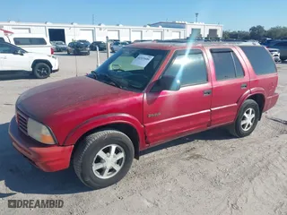 2001 Oldsmobile Bravada with VIN 1GHDT13W512108175, listed as a IAAI auction lot 41533600 with 178,558 mi miles. Bid and sale history available at carsss.com. Image 2.