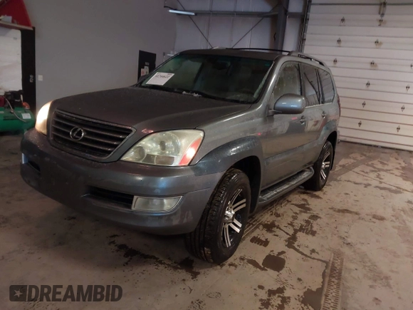 2004 Lexus GX 470 with VIN JTJBT20X540056639, listed as a IAAI auction lot 41744622 with 228,326 mi miles. Bid and sale history available at carsss.com. Image 2.