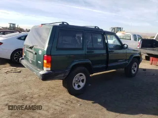 2001 Jeep Cherokee Sport with VIN 1J4FT48S61L522723, listed as a Copart auction lot 87115404 with 0 mi miles and Clean Title. Bid and sale history available at carsss.com. Image 3.