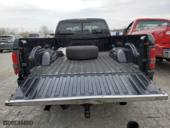 1998 Dodge Ram 1500 with VIN 1B7HC13Z4WJ143224, listed as a Copart auction lot 79952784 with 209,754 mi miles and Salvage Title. Bid and sale history available at carsss.com. Image 6.