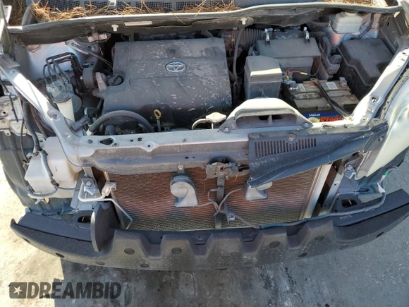 2012 Toyota Sienna LE AAS with VIN 5TDKK3DC8CS259085, listed as a Copart auction lot 73592584 with 198,370 mi miles and Salvage Title. Bid and sale history available at DreamBid. Image 12.