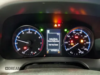 2018 Toyota RAV4 LE with VIN 2T3BFREV6JW763007, listed as a Copart auction lot 58604545 with 107,683 mi miles and Salvage title. Bid and sale history available at DreamBid. Image 9.