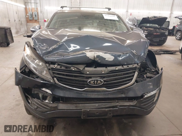 2011 Kia Sportage EX with VIN KNDPCCA27B7037886, listed as a IAAI auction lot 42264598 with 211,538 mi miles and . Bid and sale history available at DreamBid. Image 6.