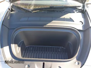 2025 Tesla Model Y Long Range with VIN 7SAYGDED7SA376233, listed as a IAAI auction lot 41777876 with 70 mi miles and . Bid and sale history available at DreamBid. Image 10.