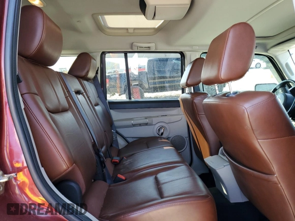 2007 Jeep Commander Limited z VIN 1J8HG58257C610852, wystawiony jako Copart lot #49461225 z przebiegiem 91 125 mil mil oraz Szkoda całkowita • Salvage title. Historia ofert i sprzedaży dostępna na DreamBid. Obrazek 11.