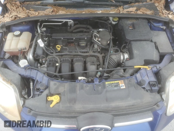 2012 Ford Focus S with VIN 1FAHP3E29CL241994, listed as a Copart auction lot 51617945 with 123,041 mi miles and Salvage Title. Bid and sale history available at DreamBid. Image 11.