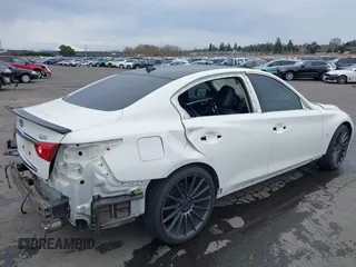 2014 Infiniti Q50 Premium z VIN JN1BV7AP8EM671403, wystawiony jako IAAI lot #41837716 z przebiegiem 115 058 mil mil oraz . Historia ofert i sprzedaży dostępna na DreamBid. Obrazek 6.