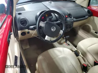 2009 Volkswagen Beetle S with VIN 3VWRG31YX9M400423, listed as a Copart auction lot 45750915 with 113,410 mi miles and Salvage title. Bid and sale history available at DreamBid. Image 8.