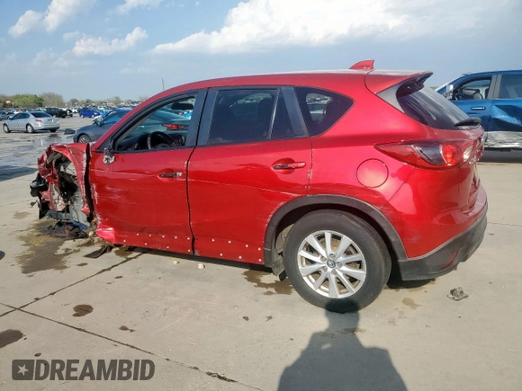 2014 Mazda CX-5 Touring with VIN JM3KE2CY1E0323298, listed as a Copart auction lot 50421685 with 214,739 mi miles and Salvage Title. Bid and sale history available at DreamBid. Image 2.