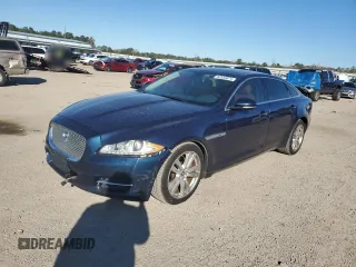 2013 Jaguar XJ with VIN SAJWA2G16DLV50973, listed as a Copart auction lot 82555074 with 148,956 mi miles and Salvage Title. Bid and sale history available at carsss.com. Image 1.