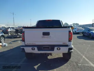 2016 GMC Sierra 1500 SLT with VIN 3GTU2NEC2GG244329, listed as a IAAI auction lot 40810002 with 121,716 mi miles. Bid and sale history available at carsss.com. Image 16.
