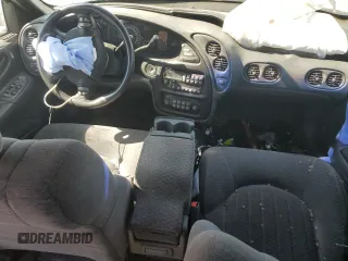 2001 Pontiac Bonneville SE z VIN 1G2HX54K714188652, wystawiony jako Copart lot #49488005 z przebiegiem 157 968 mil mil oraz Tytuł czysty. Historia ofert i sprzedaży dostępna na DreamBid. Obrazek 8.