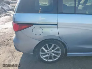 2012 Mazda Mazda5 Touring with VIN JM1CW2CL3C0131103, listed as a IAAI auction lot 41786709 with 126,232 mi miles. Bid and sale history available at carsss.com. Image 13.