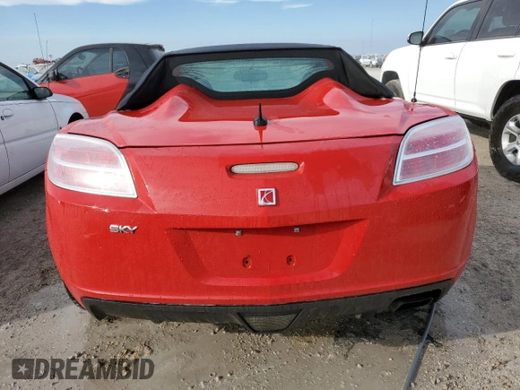 2009 Saturn Sky z VIN 1G8MN35B79Y103875, wystawiony jako Copart lot #74669844 z przebiegiem Nie podano mil oraz Szkody całkowita. Historia ofert i sprzedaży dostępna na DreamBid. Obrazek 6.