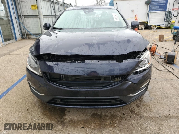 2016 Volvo S60 T5 Drive-E Premier z VIN YV126MFK5G2412365, wystawiony jako Copart lot #51577155 z przebiegiem 59 319 mil mil oraz Szkoda całkowita • Salvage title. Historia ofert i sprzedaży dostępna na DreamBid. Obrazek 5.
