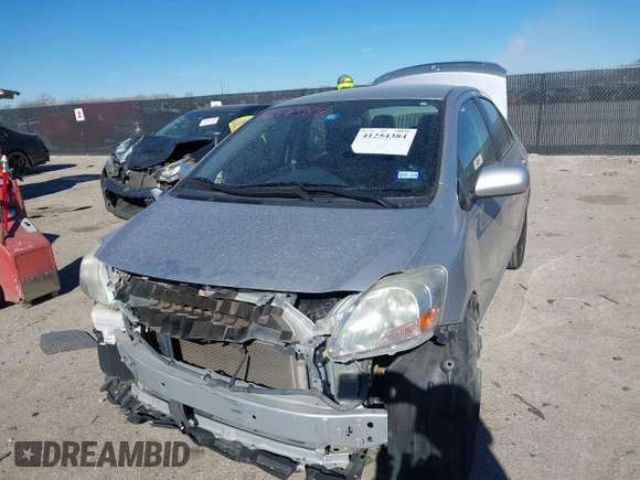2012 Toyota Yaris z VIN JTDBT4K35CL038860, wystawiony jako IAAI lot #41254384 z przebiegiem 161 536 mil mil oraz . Historia ofert i sprzedaży dostępna na DreamBid. Obrazek 2.