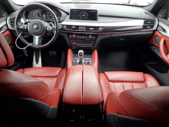 2018 BMW X6 sDrive35i with VIN 5UXKU0C52J0G81057, listed as a Copart auction lot 50698205 with 67,735 mi miles and Salvage Title. Bid and sale history available at carsss.com. Image 8.