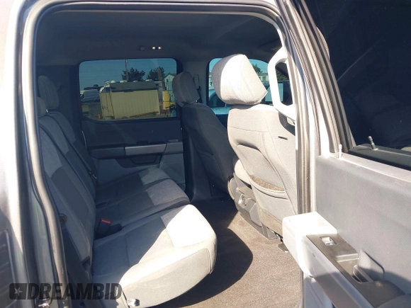 2021 Ford F-150 XL with VIN 1FTFW1E86MKD57397, listed as a IAAI auction lot 42174774 with 59,227 mi miles and . Bid and sale history available at DreamBid. Image 8.