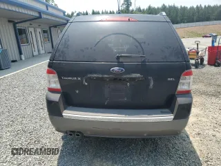 2008 Ford Taurus X SEL with VIN 1FMDK02W08GA29428, listed as a Copart auction lot 58902675 with 256,008 mi miles and Salvage title. Bid and sale history available at DreamBid. Image 6.