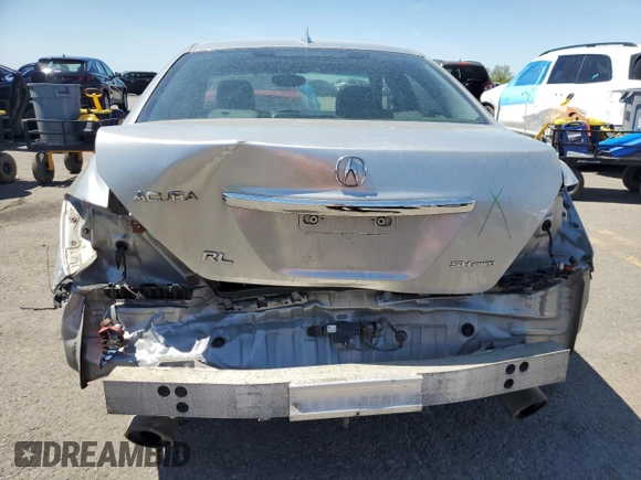 2006 Acura RL z VIN JH4KB16556C008497, wystawiony jako Copart lot #55069615 z przebiegiem 204 350 mil mil oraz Szkoda całkowita • Salvage title. Historia ofert i sprzedaży dostępna na DreamBid. Obrazek 6.