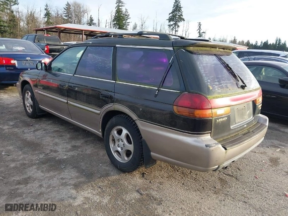 1999 Subaru Legacy Wagon Outback with VIN 4S3BG6856X7603852, listed as a IAAI auction lot 41299373 with 168,991 mi miles. Bid and sale history available at carsss.com. Image 3.