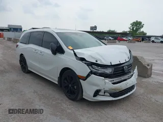 2023 Honda Odyssey Sport z VIN 5FNRL6H74PB045229, wystawiony jako IAAI lot #42275541 z przebiegiem 23 607 mil mil oraz . Historia ofert i sprzedaży dostępna na DreamBid. Obrazek 1.
